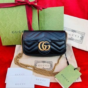 Gucci GG Marmont matelassé super mini bag in black, brand new, full packaging